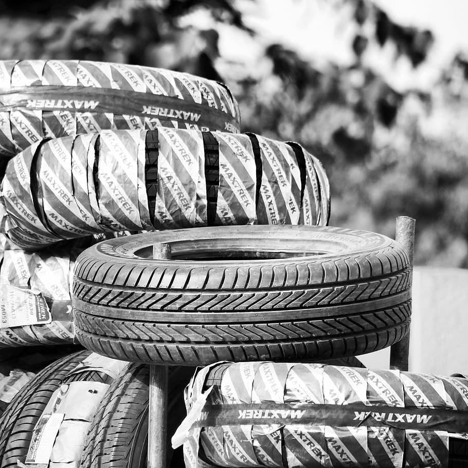 pile of tires, tyres, rubber, tire, wheel, car, auto, vehicle, transportation, black
