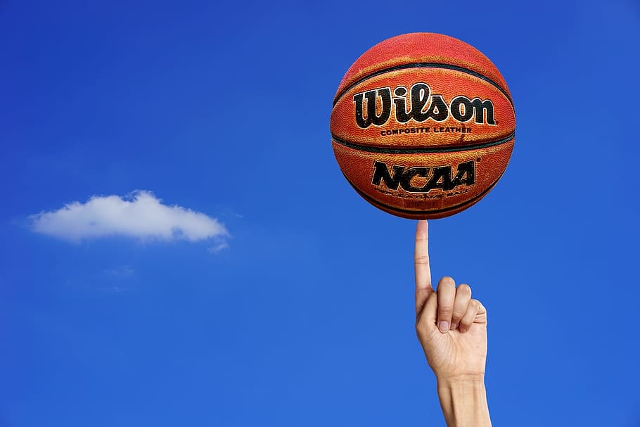 wilson ncaa ball, left, person index finger, basketball, ball, ball game, basket, ball sports, sport, outdoor