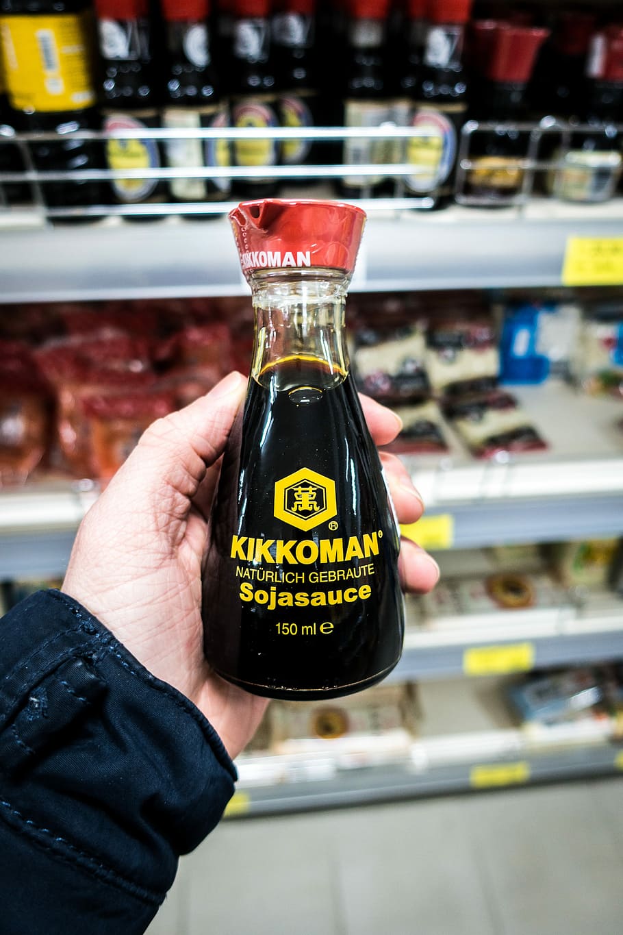 kikkoman soy sauce, Kikkoman, soy sauce, retail, store, editorial, bottle, consumerism, brand-name, human hand