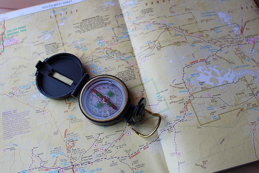 round gold-colored compass, map, compass, navigation, western australia, world map, direction, high angle view, guidance, exploration