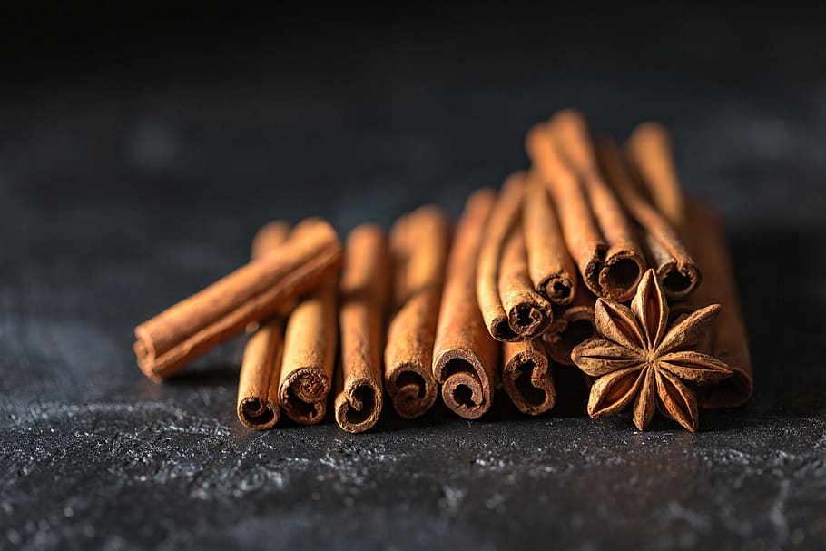 brown, nuts, pile, sticks, cinnamon, cinnamon sticks, anise, star anise, seeds, spices