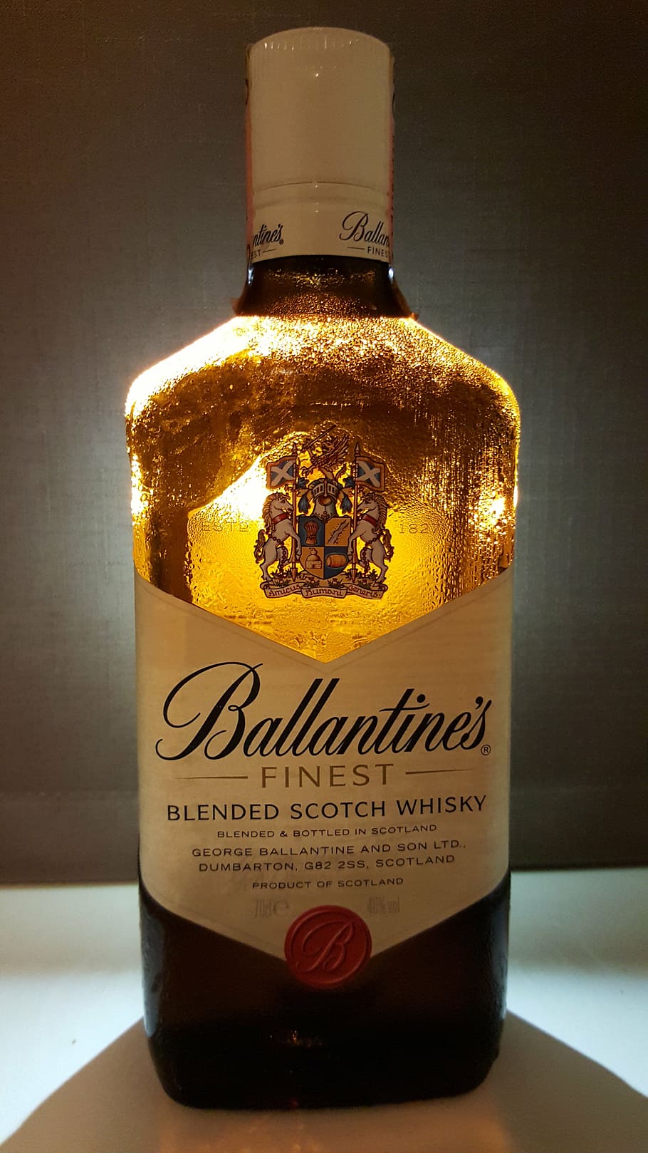 ballantine's, scotch whiskey, finest whiskey, bottle, text, container, western script, indoors, close-up, glass - material