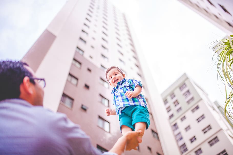 building, tower, sky, blur, people, man, kid, baby, father, son