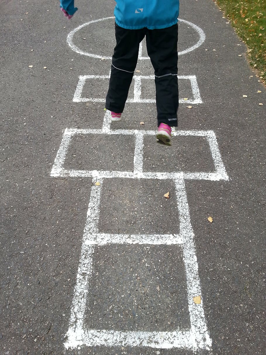 person, playing, street game, daytime, jump, child, man, finnish, girl, panel