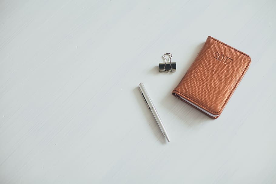 gray, twist pen, brown, leather wallet, paper clip, white, surface, notebook, notes, diary