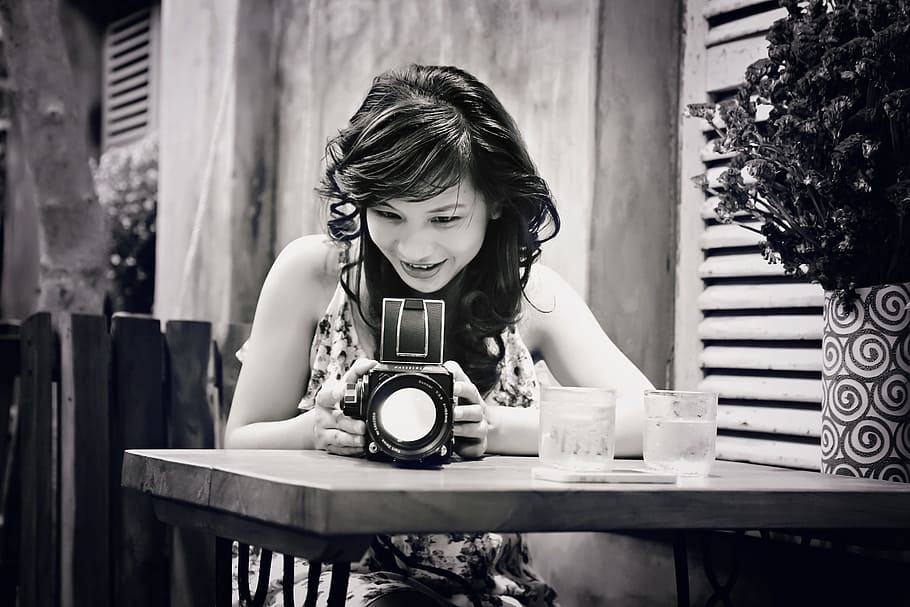 woman, holding, camera, table, girl, vietnam, female, asian, people, lifestyle