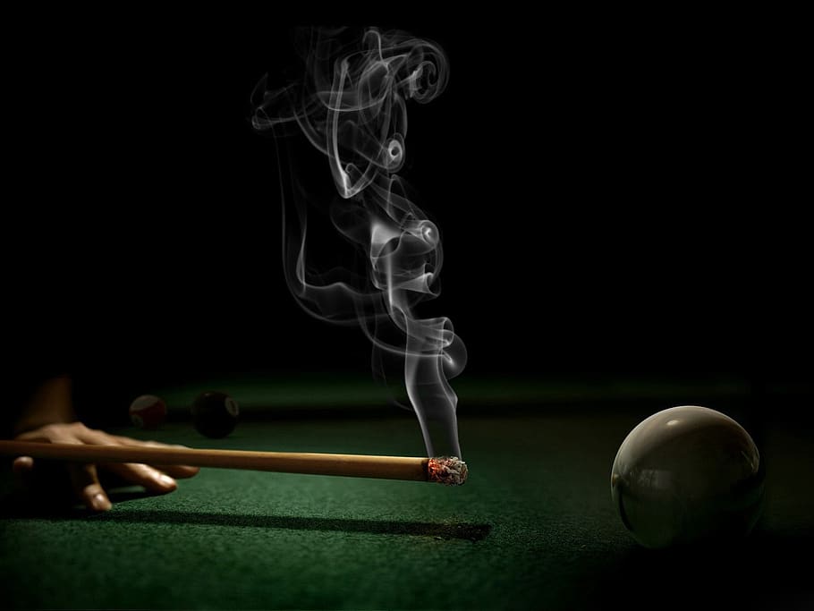 billiards, cigarette, sport, ball, black background, leisure activity, aiming, activity, smoke - physical structure, motion