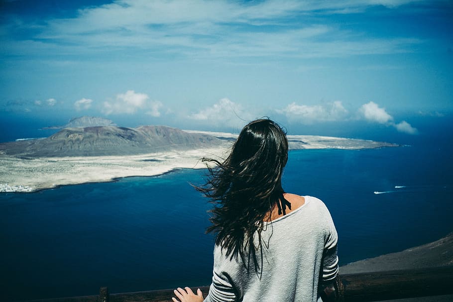 woman, mountain, landscape, blue sky, sea, water, ocean, hill, travel, wind