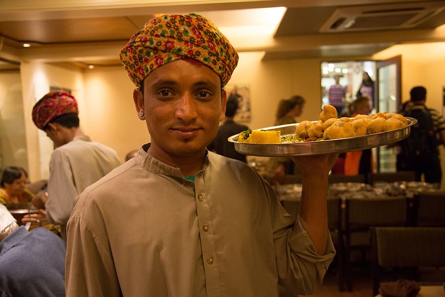 man, gray, top, holding, silver tray indoors, india, waiter, oriental, boy, server