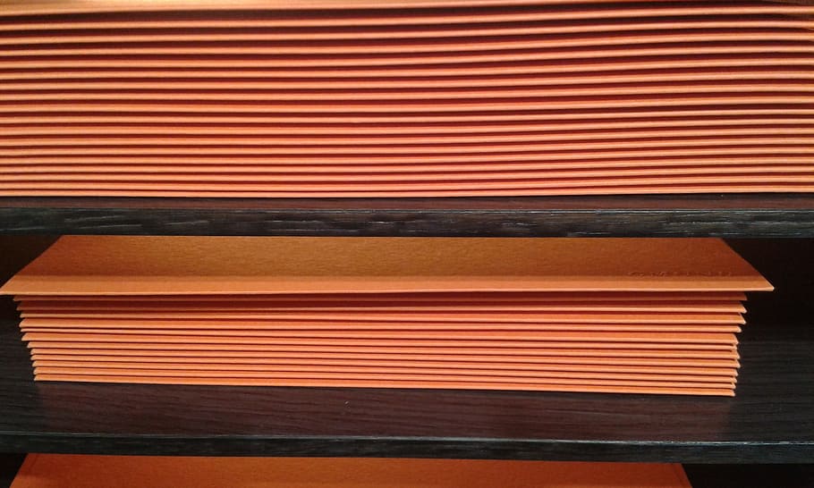 envelopes, orange, shelf, striped, pattern, indoors, close-up, red, architecture, wood - material