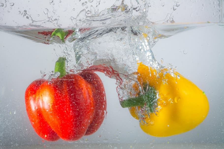 two, red, yellow, bell peppers, water, inject, paprika, spray, water splashes, spill over