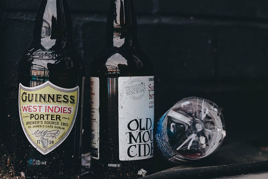 three, bottles, placed, black, wall, guinness, west, indies, porter, bottle