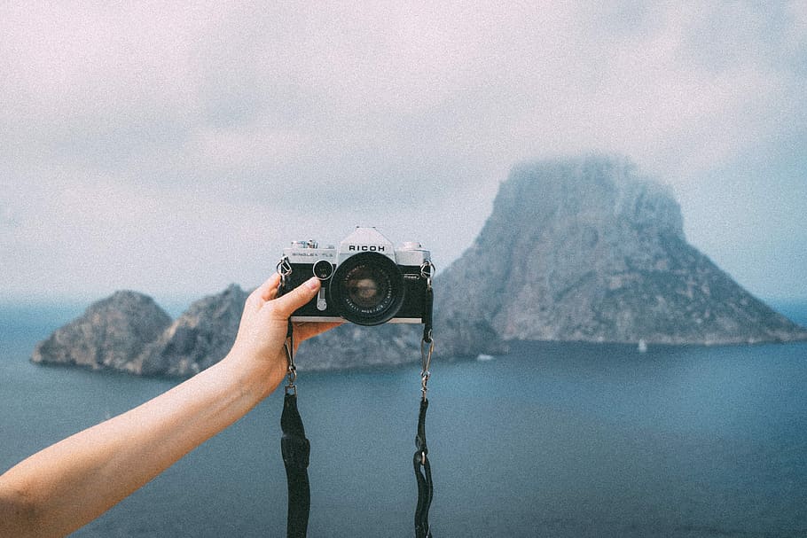 camera, lens, selfie, slr, hand, arm, island, mountain, sky, clouds
