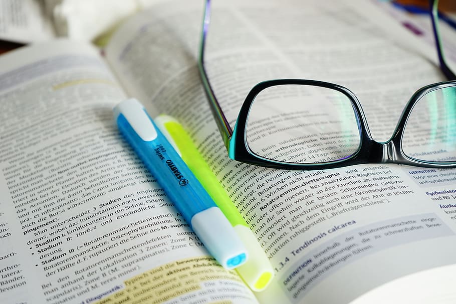 eyeglasses, book page, glasses, read, learn, book, text, highlighter, pen, intellectual