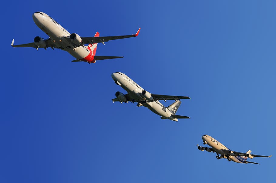three airplanes, aircraft, qantas, air new zealand, lan chile, boeing 737, airbus, a320, take-off, auckland airport