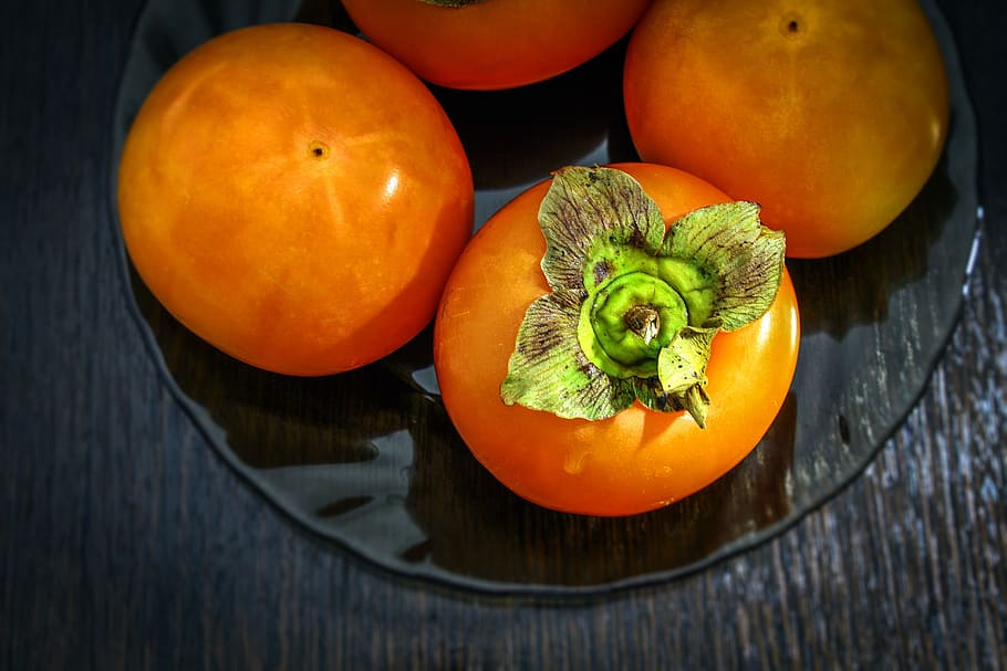 persimmon, four pieces, food, fruit, useful, in a plate, glass, brown, freshness, juiciness
