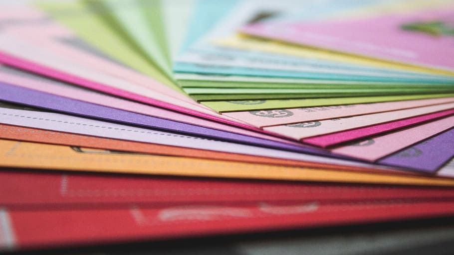 multicolored playing cards, piled, papers, swatches, colors, colours, multi colored, backgrounds, indoors, close-up