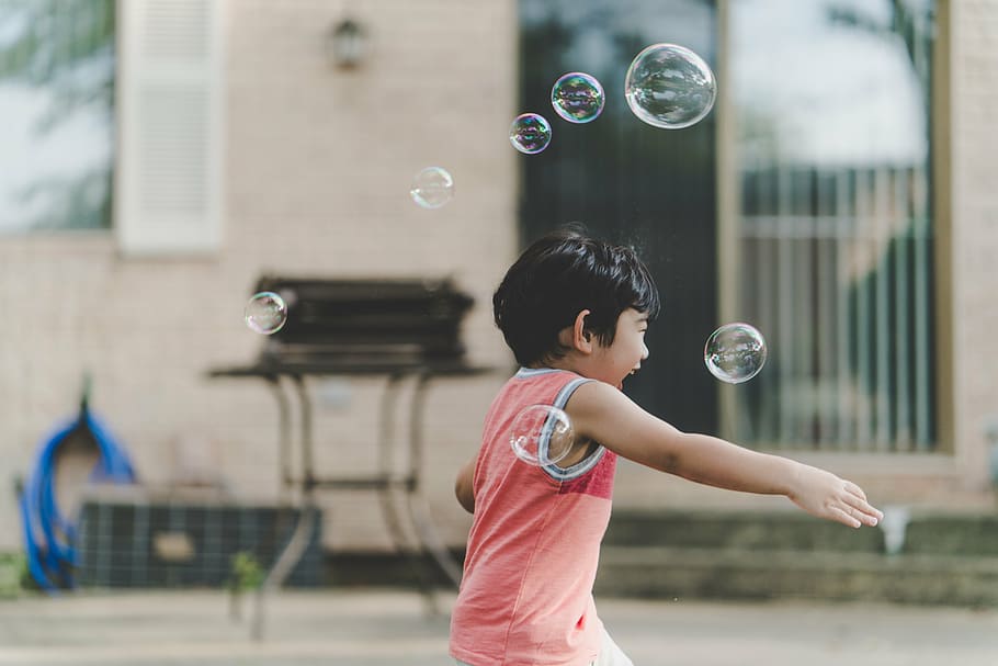 selective, focus photography, boy, chasing, bubbles, playing, daytime, people, kid, child