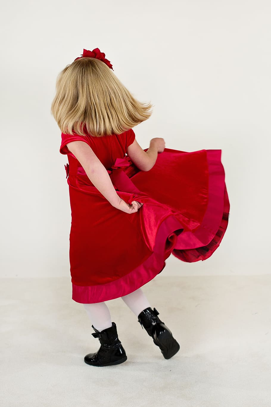 girl, wearing, red, velvet short-sleeved dress, little girl, running, red dress, happy, child, little