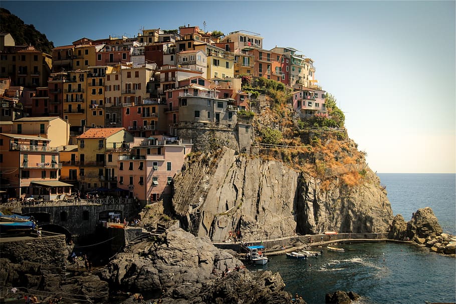 houses, mountains, hills, apartments, architecture, rocks, cliffs, coast, ocean, sea