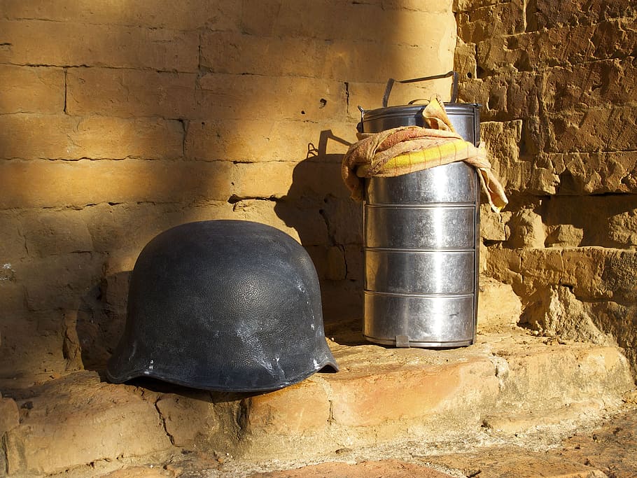 helmet, lunch box, metal, wall - building feature, architecture, old, container, built structure, wall, brick