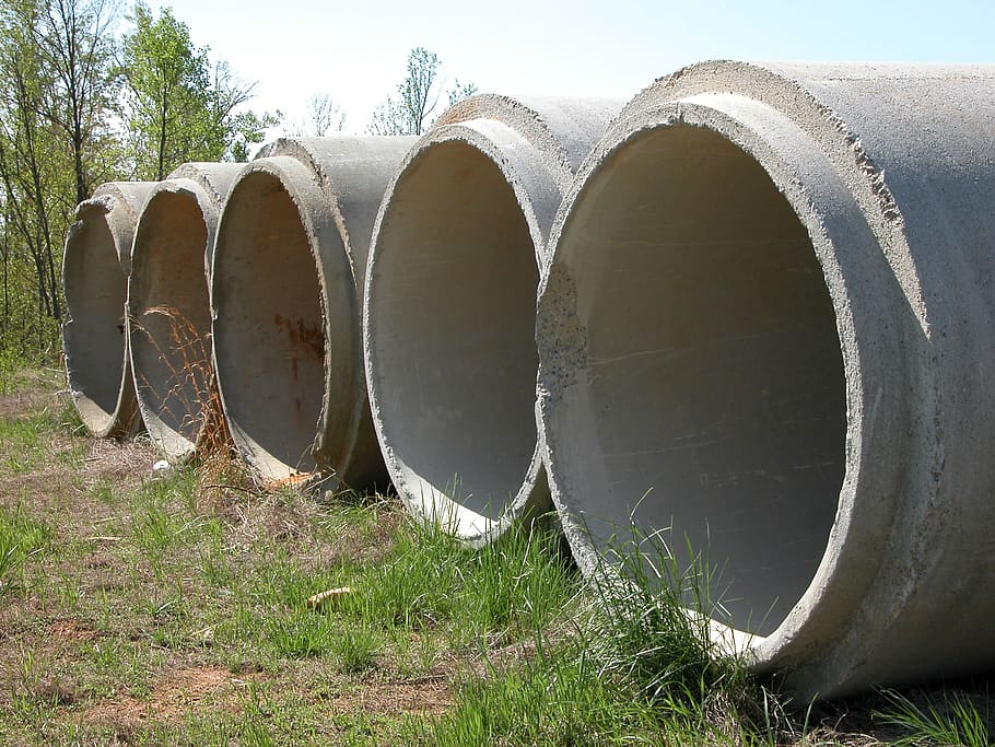 drainage pipe, concrete, drainage, plant, industry, grass, land, field, day, nature