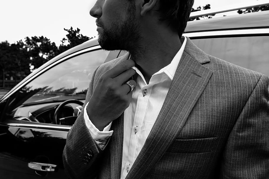 grayscale photography, man, wearing, formal, suit, male, business, man in suit, car, cadillac