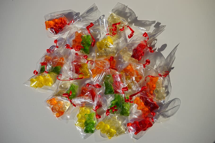 gummi bears, packed, sachets, mitbringsel, cellophane, gummi bear, bear, sweetness, colorful, color