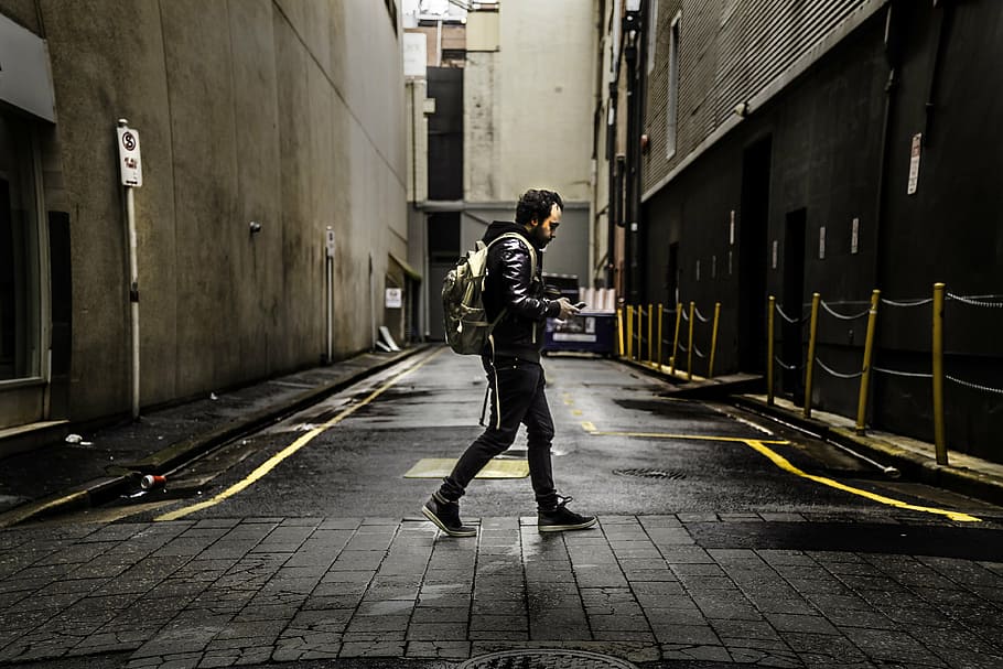 person, black, jacket, walking, alley, fashion, man, pavement, road, street