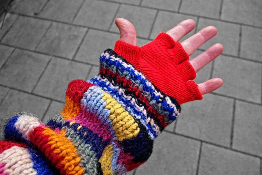 person, wearing, multicolored, fingerless hand, warmer, arm, hand, finger, body, body part