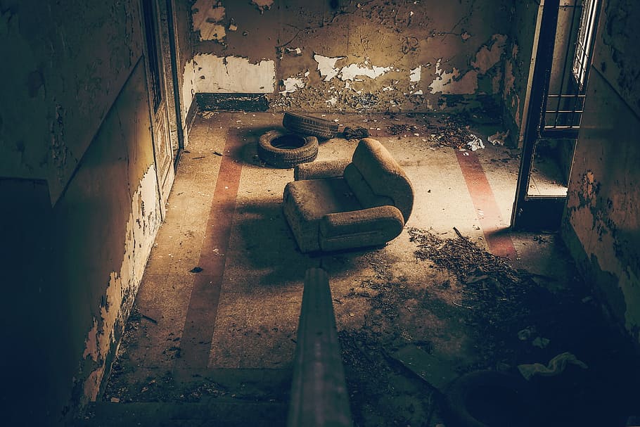brown, sofa chair, inside, room, ruins, abandoned, dirt, wheels, tires, couch