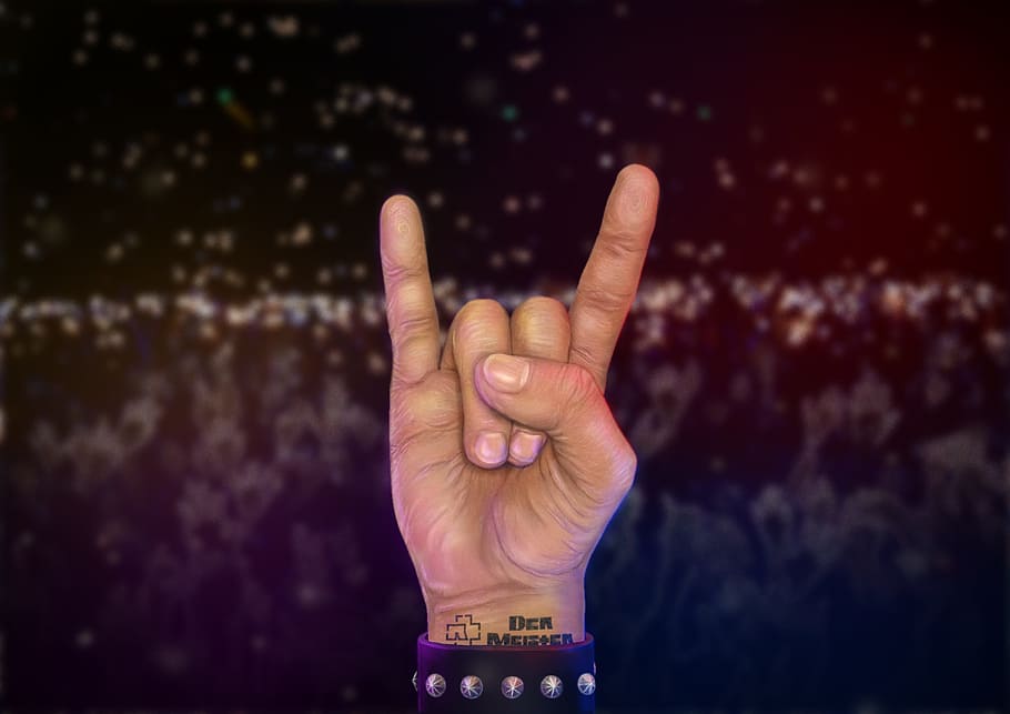 persona, mostrando, rock, 'n, n roll gesto de la mano, mano, manos, concierto, metal, figura