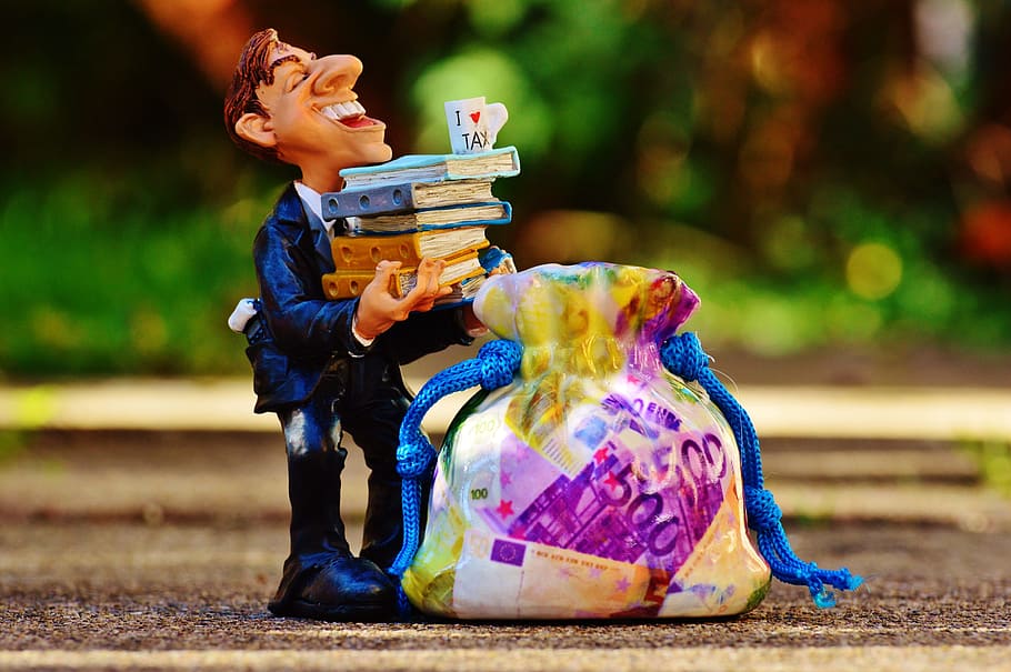 man, carrying, books figurine, taxes, tax consultant, finance, money, tax return, billing, income tax