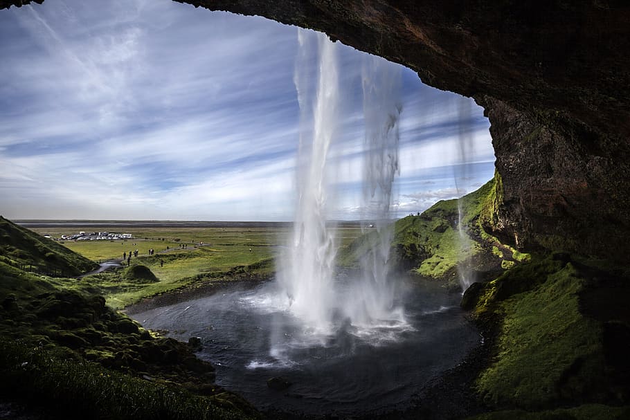 waterfalls near cave, seljalandsfoss, waterfall, iceland, scenics - nature, beauty in nature, water, nature, environment, sky