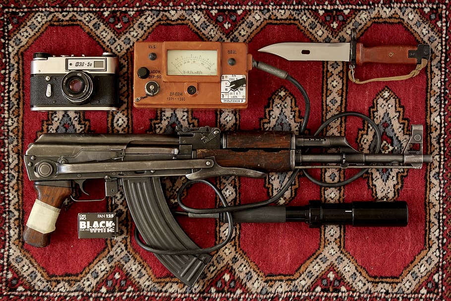 black, brown, gray, camera, tactical, knife place, red, area rug, black and brown, AK-47