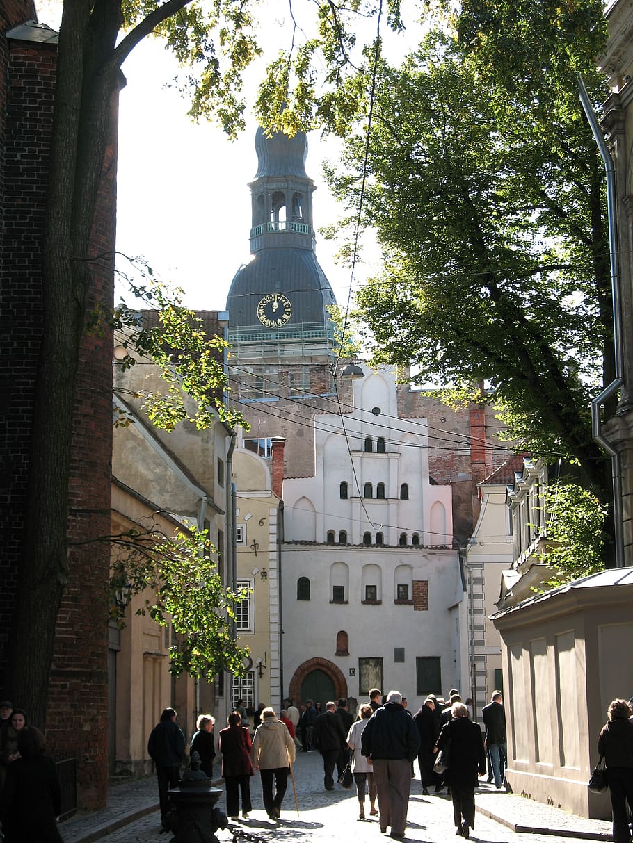 latvia, riga, street, architecture, built structure, building exterior, tree, group of people, place of worship, plant