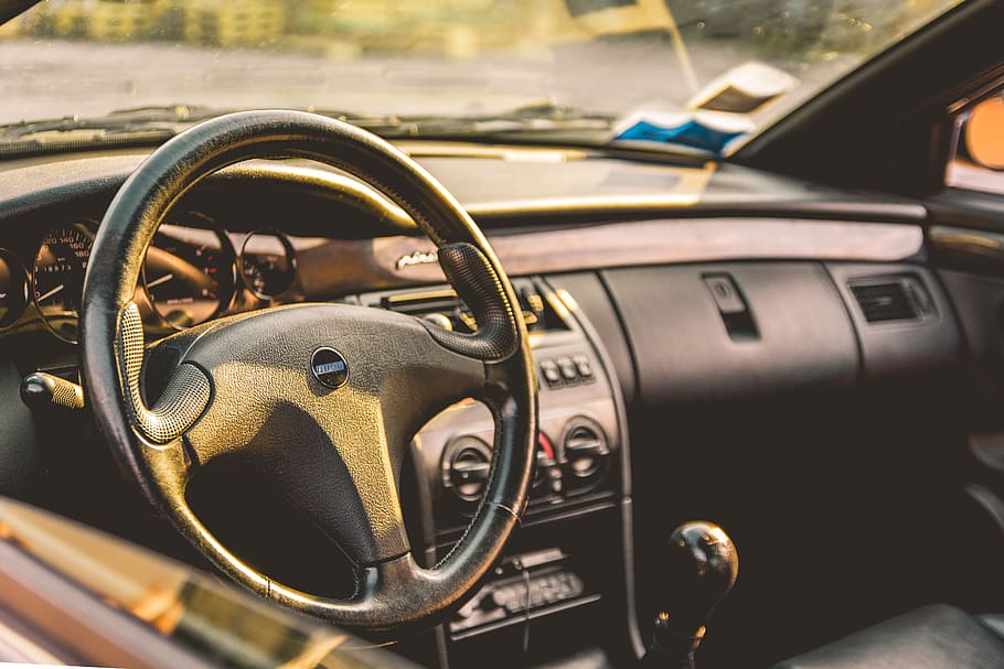 steering wheel, car, mirror, windshield, vehicle, transportation, sunlight, travel, gear, shift