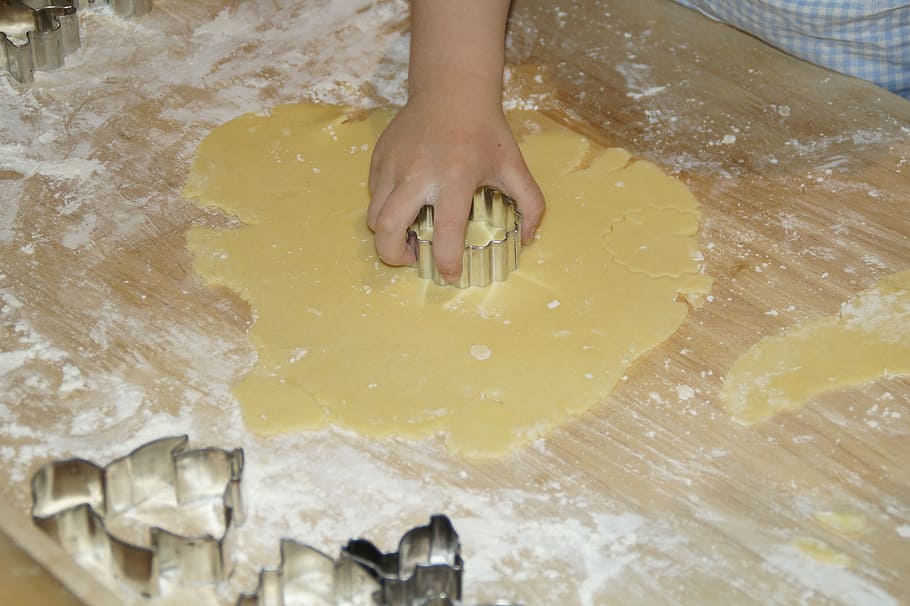 person, holding, gray, dough cutter, child, children, bake, cookie cutter, cookie, cookies