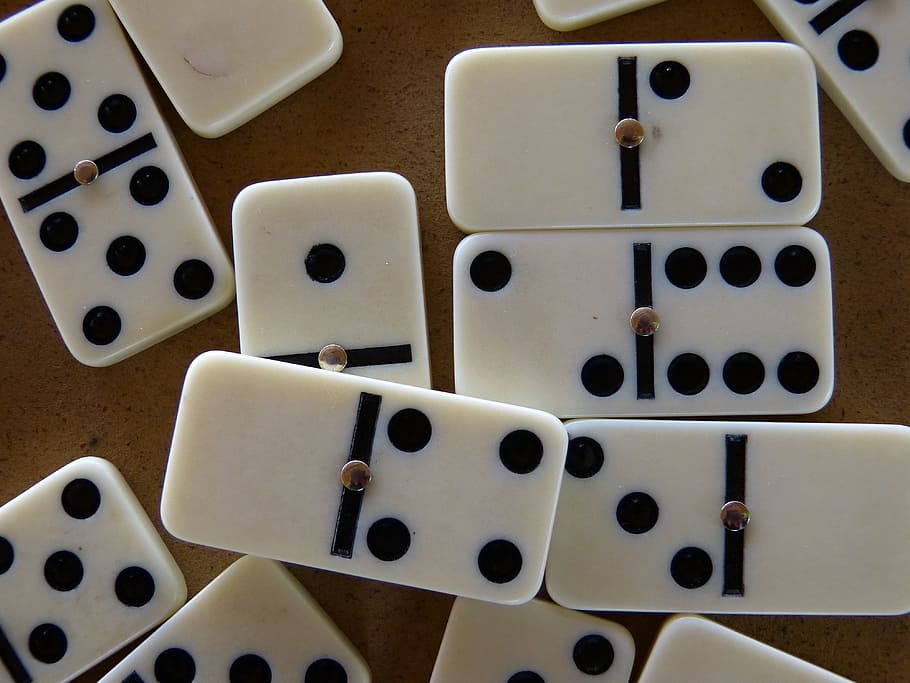 white-and-black domino lot, domino, stones, dominoes, play stone, play, pastime, children, hobby, fun