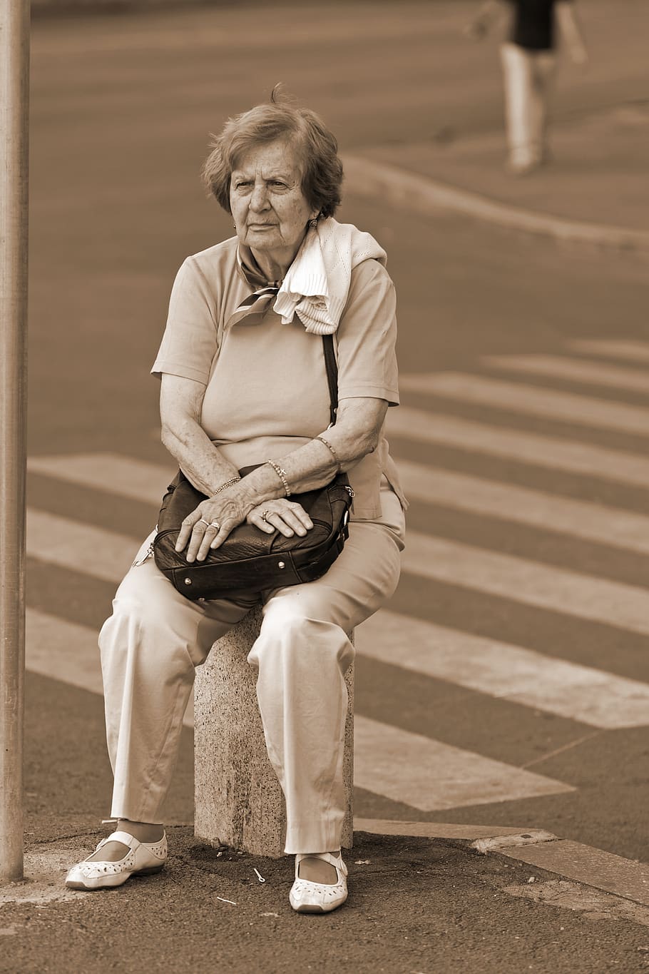 woman, old, man, person, bag, waiting for, seated, street, intersection, pedestrian crossing