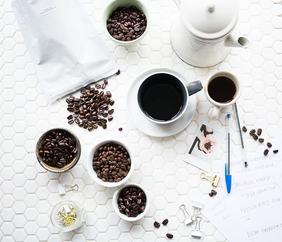 coffee, beans, seeds, espresso, drink, pen, paper, clip, table, food and drink