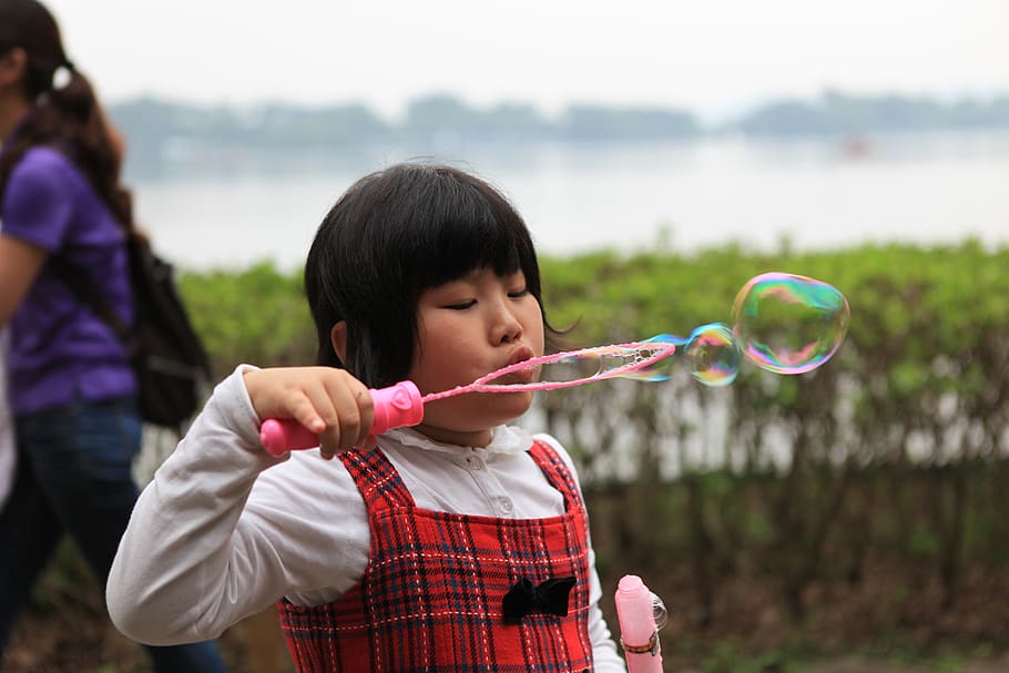girls, child, blowing bubbles, tourism, childhood, holding, offspring, bubble, focus on foreground, females