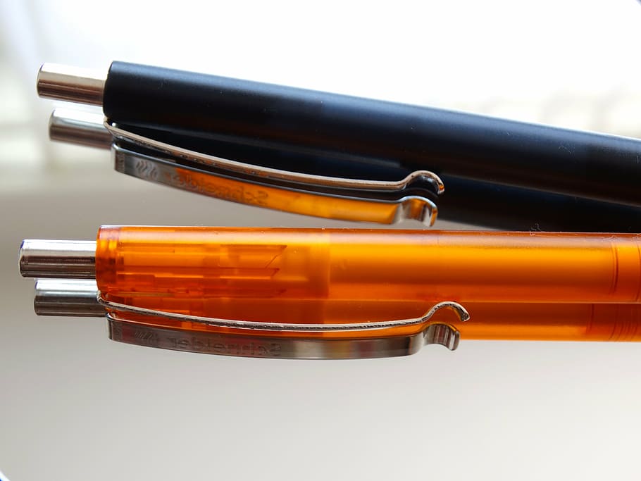 kulli, pen, writing implement, writing utensil, orange, black, studio shot, indoors, still life, white background