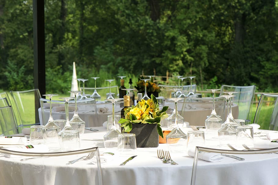 wine glasses, table, top, flower arrangement, breakfast, party, banquet facilities, outdoors, serving, household equipment