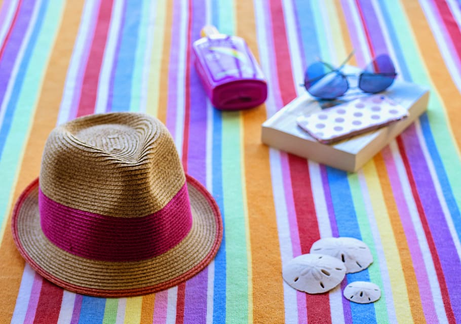 brown, pink, hat, blue, aviator-style sunglasses, vacation, beach, sea, ocean, pool