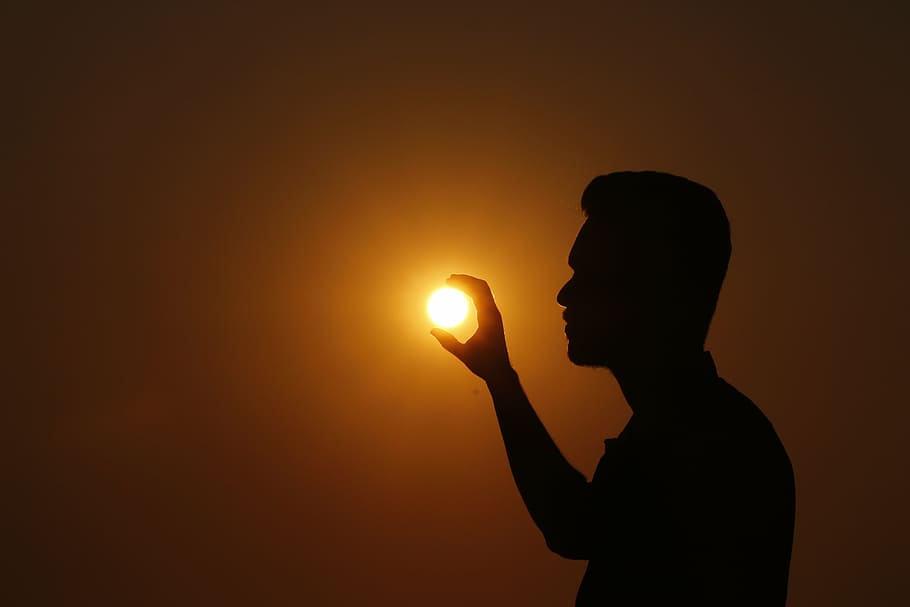 forced, perspective photo, silhouette, man, holding, sun, sunset, shadow, shadow man, evening