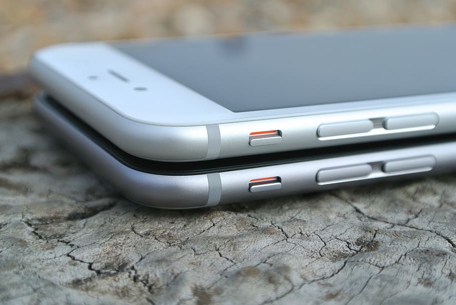 two silver 6's, iphone 6, apple, ios, iphone, ios 8, mobile, phone, cellphone, cellular
