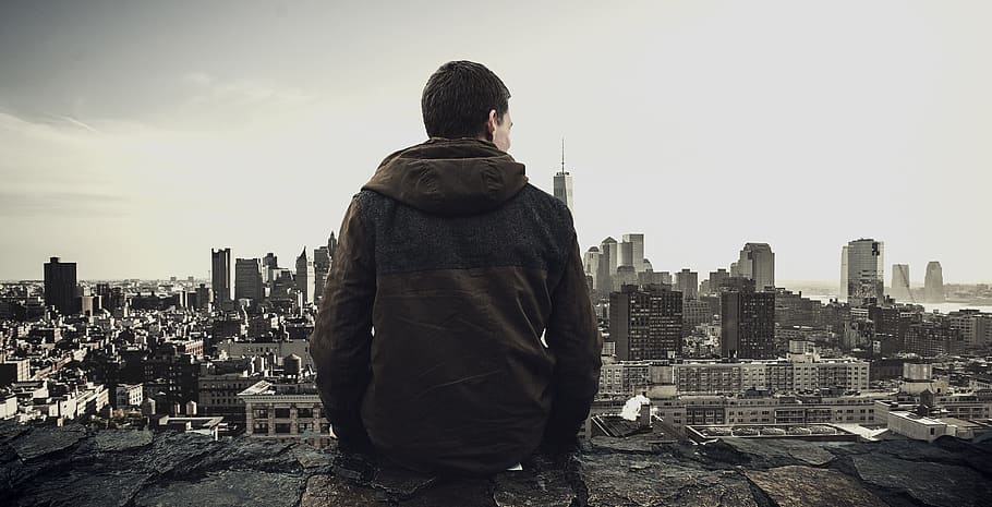 person, sitting, edge, overlooking, city, architecture, buildings, cityscape, man, skyline