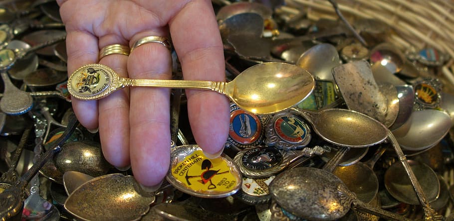 hand, rings, spoons, decorative spoons, collectable spoons, op shop, old spoons, open hand, woman, gold