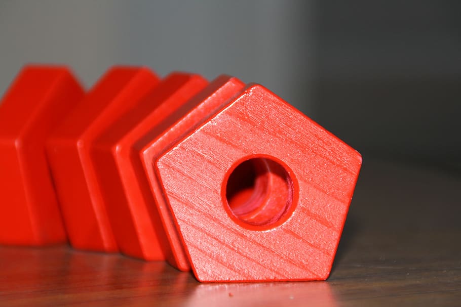 macro shot photography, red, wooden, tool, pentagon, puzzle, challenge, design, solution, shape